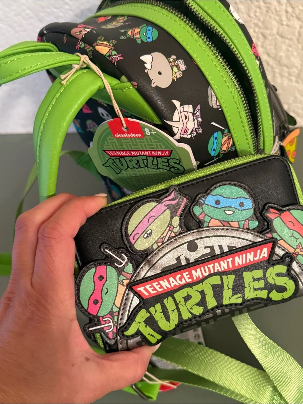 Loungefly: Teenage Mutant Ninja Turtles Sewer Cap AOP Mini Backpack and Wallet